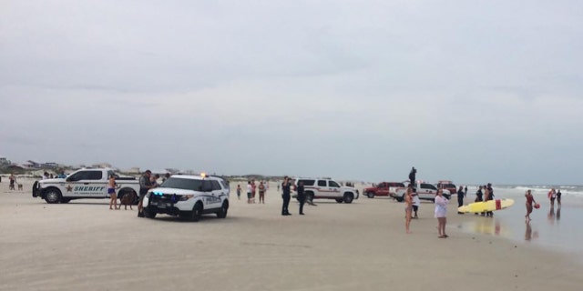 Emergency personnel responded to a distress call at a Florida beach Sunday.