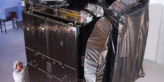 The Galaxy 15 satellite is seen before its 2005 launch to geostationary orbit nearly 36,000 kilometers over the Earth's equator.