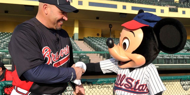 In Orlando, with Mickey Mouse and the Atlanta Braves.