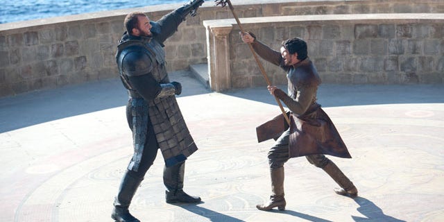 Duel to the Death: The Mountain (Hafthor Julius Bjornsson) squares off against Oberyn Martell (Pedro Pascal) (Courtesy HBO)