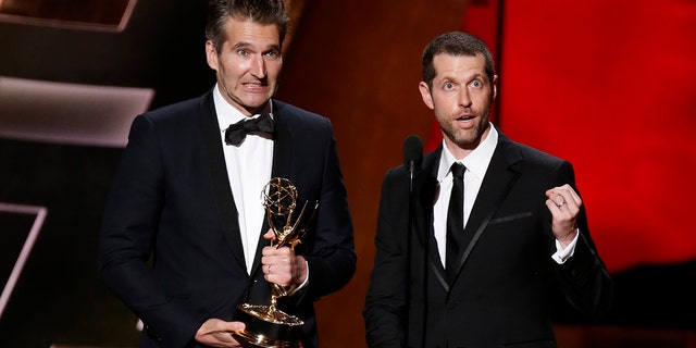 David Benioff (L) and D.B. Weiss accept the award for Outstanding Writing For A Drama Series for HBO's "Game of Thrones" at the 67th Primetime Emmy Awards in Los Angeles, California September 20, 2015. REUTERS/Lucy Nicholson - TB3EB9L06GQU7