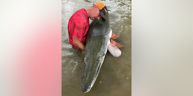 Bubba Bedre shares a photo of the massive alligator gar pulled out of Trinity River south of Dallas on July 9.