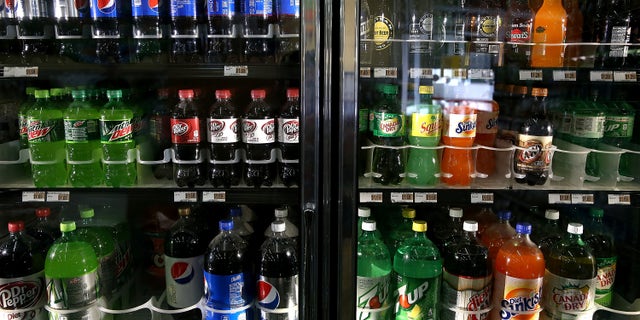 SAN FRANCISCO, CA - JULY 22: Various bottles of soda are displayed in a cooler at Marina Supermarket on July 22, 2014 in San Francisco, California. The San Francisco Board of Supervisors will vote on Tuesday to place a measure on the November ballot for a 2-cents-per-ounce soda tax. If the measure passes in the November election, tax proceeds would help finance nutrition, health, disease prevention and recreation programs. (Photo by Justin Sullivan/Getty Images)