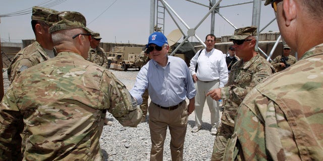 Sunday: Defense Secretary Robert Gates thanks troops at Forward Operating Base (FOB) Walton in Kandahar, Afghanistan.