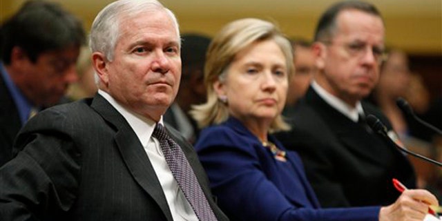 Defense Secretary Robert Gates, left, Secretary of State Hillary Clinton, middle, and Chairman of the Joint Chiefs of Staff Adm. Mike Mullen, testify on Capitol Hill Dec. 2. (AP Photo)