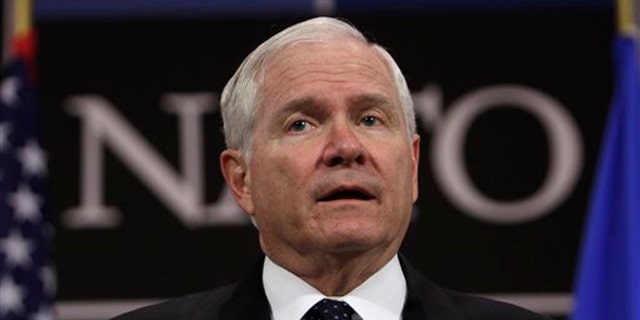 Defense Secretary Robert Gates speaks during a media conference after a meeting of NATO defense ministers at NATO headquarters in Brussels June 9.