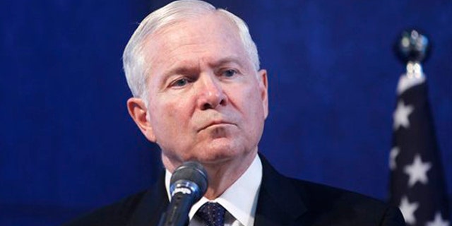 Defense Secretary Robert Gates listens during a joint news conference with Israel's Defense Minister Ehud Barak, not pictured, in Tel Aviv, Israel, March 24.