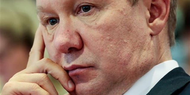 Alexey Miller, CEO of the Russian energy supplier Gazprom, listens during a press conference as part of a meeting of the European Union energy commissioner Guenther Oettinger Russia's energy minister Alexander Novak and Ukraine's energy minister Yuri Prodan in Berlin, Friday, May 30, 2014. (AP Photo/Markus Schreiber)