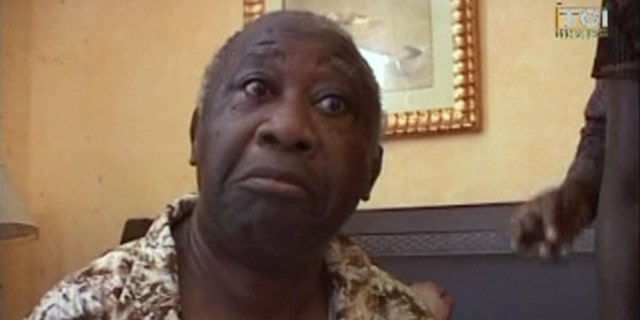 April 11: In this image made from television, Laurent Gbagbo is seen after his arrest at the Golf Hotel in Abidjan, Ivory Coast. After a week of heavy fighting, forces backing Ivory Coast's internationally recognized leader Alassane Ouattara on Monday arrested strongman Laurent Gbagbo who had refused to leave the presidency despite losing elections more than four months earlier. (AP/TCI via APTN)