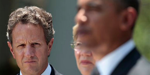 Treasury Secretary Timothy Geithner, left, and Elizabeth Warren, center, listen to President Obama July 18 in the Rose Garden in Washington.