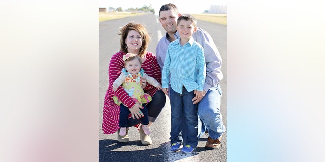 The Dumas couple were thrilled when gallons of pink water was thrown out of the aircraft, revealing that they were expecting another daughter.
