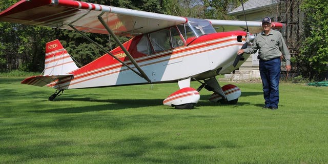Gene Hanson takes photos of his crop messages from his plane.