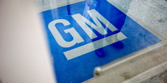 Jan. 10, 2013: The logo for General Motors decorates the entrance at the site of a GM information technology center in Roswell, Ga.