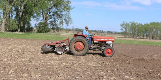 Gene Hanson has plowed numerous messages into his bean field.