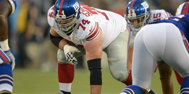 Aug 3, 2014; Canton, OH, USA; New York Giants left guard Geoff Schwartz (74) during the 2014 Hall of Fame game against the Buffalo Bills at Fawcett Stadium. Mandatory Credit: Kirby Lee-USA TODAY Sports
