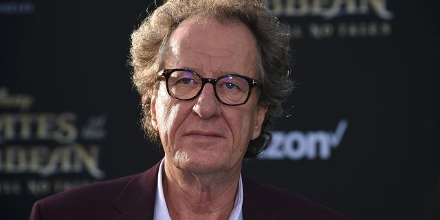 Geoffrey Rush is denying accusations of touching a woman inappropriately.