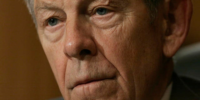 Sen. George Voinovich, R-Ohio, listens to testimony by Andrew Natsios, the special U.S. envoy to Sudan, not pictured, during a Senate Foreign Relations Committee hearing on Capitol Hill in Washington, Wednesday, April 11, 2007. (AP Photo/Charles Dharapak)