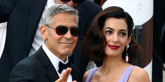 Actor and director George Cloone says his wife, Amal, has forbidden him to drive motorcycles.