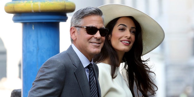 September 29, 2014. George Clooney and his wife Amal Alamuddin arrive at Venice city hall for a civil ceremony to formalize their wedding in Venice.