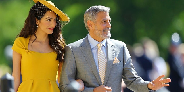 Amal and George Clooney arrive Saturday to attend the royal wedding.
