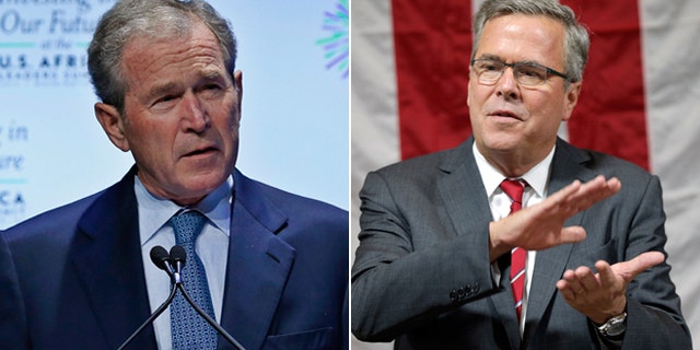 In this Aug. 6, 2014 photo, former U.S. President George W. Bush speaks at the "Investing in Our Future" forum at the US-Africa Leaders Summit in Washington and former Florida Gov. Jeb Bush speaks during an event in Greensboro, N.C. on Wednesday, Sept. 24, 2014. (AP Photo/Chuck Burton)