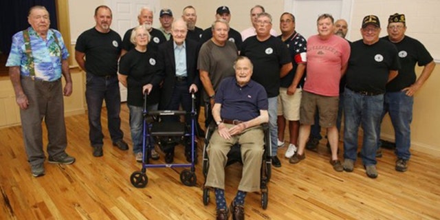 Bush seen posing with attendees of a monthly pancake breakfast at the American Legion Post 159 in Kennebunkport, Maine on Saturday. (Office of former President George H.W. Bush via AP)