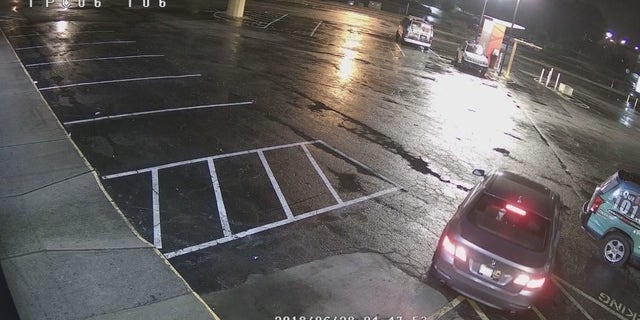 Images captured the Georgia burglars fleeing the scene in a getaway vehicle after robbing a store.