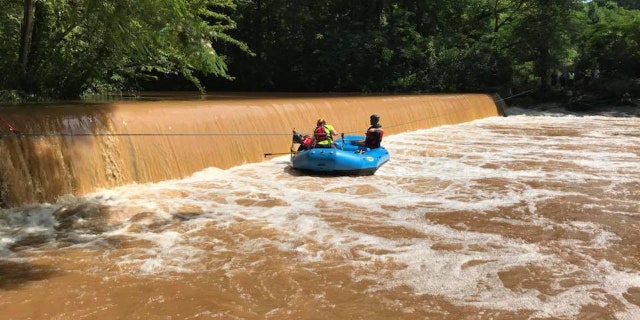 Authortiies search Barber Creek for two missing teenage boys.