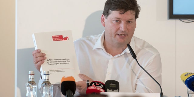 Ulrich Weber, a lawyer tasked with shedding light on the Regensburg Cathedral abuse case, speaks at a press conference at which the release of the final report on the case was announced in Regensburg, Germany, Tuesday, July 18, 2017.