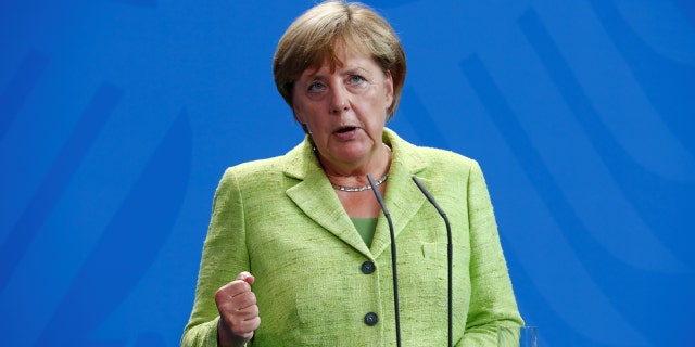 German Chancellor Angela Merkel addresses a news conference at the Chancellery in Berlin last August.