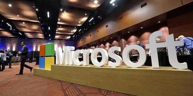 Two employees are suing Microsoft for making them watch videos of bestiality, child pornography, and murder as part of their jobs. (AP Photo/Elaine Thompson)