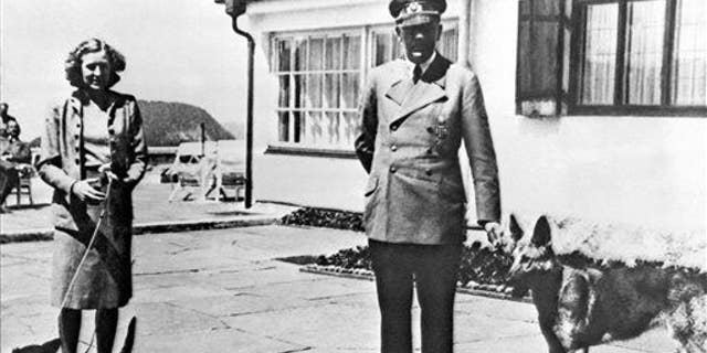 Adolf Hitler and his mistress Eva Braun pose in Berchtesgaden, Germany.