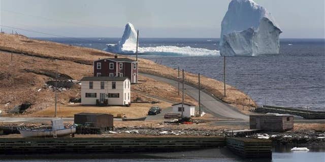 A large iceberg is visible from the shore in Ferryland, an hour south of St. John's, Newfoundland on Monday, April 10, 2017.