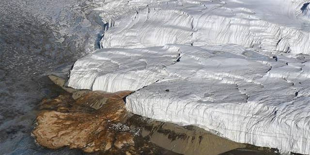 This Nov. 11, 2016, file photo shows Blood Falls, bottom left, and Taylor Glacier.