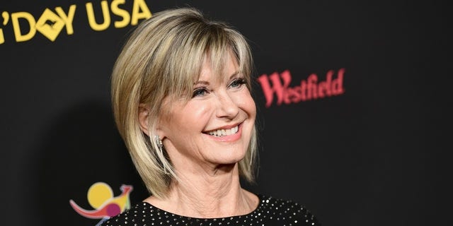 Olivia Newton-John said she's battling cancer for the third time.