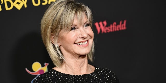 Olivia Newton-John said she's battling cancer for the third time.