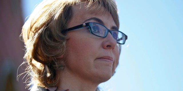Former congresswoman Gabrielle Giffords addresses a news conference for victims of the January 8, 2011 Tucson shooting, at the Safeway grocery store parking lot where Giffords was shot during the incident in Tucson March 6, 2013.