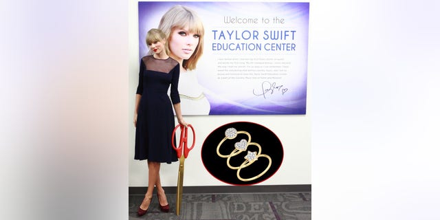 NASHVILLE, TN - OCTOBER 12: Singer Taylor Swift officially opens the Taylor Swift Education Center at the Country Music Hall of Fame and Museum on October 12, 2013 in Nashville, Tennessee. Seven-time GRAMMY winner Swift's $4 million gift to endow the center is the largest individual artist gift in the Hall of Fame's history. (Photo by Royce DeGrie/TAS/Getty Images for TAS)