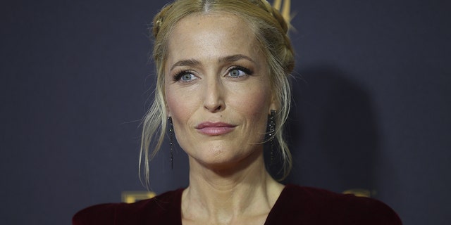69th Primetime Emmy Awards â Arrivals â Los Angeles, California, U.S., 17/09/2017 - Gillian Anderson. REUTERS/Mike Blake - HP1ED9I00T8VK