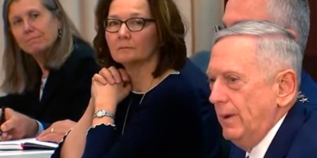 Nominee to head the CIA, Gina Haspel, center, sits alongside Secretary of Defense Jim Mattis.