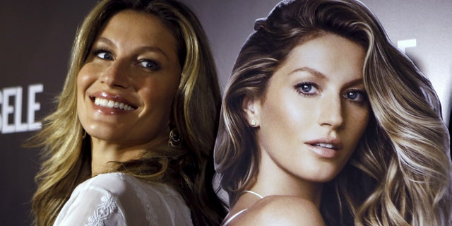 November 6, 2015. Brazilian supermodel Gisele Bundchen poses during the launch of a book that celebrates her 20-year career, in Sao Paulo, Brazil.