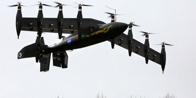 The GL-10 prototype takes off in hover mode like a helicopter.