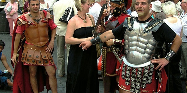 Costumed gladiators will no longer be allowed to pose for pictures and ask for money around Rome's Colosseum.