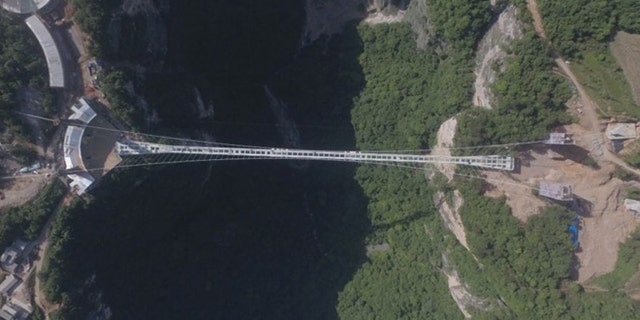 Officials at Zhangjiajie say that bridge had 10 times the amount of its load capacity of only 8,000 people per day.