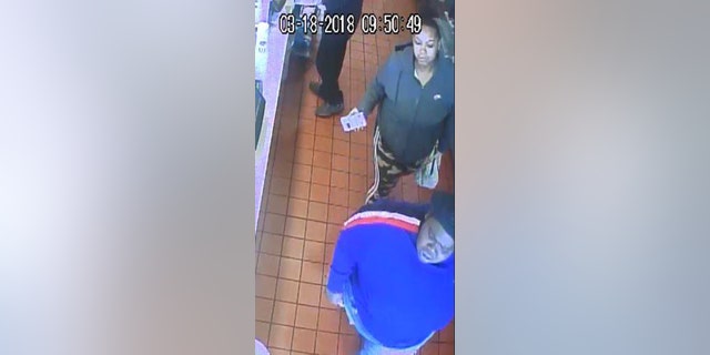 The woman and her friend had ordered a breakfast sandwich with bacon at the drive-thru, but reportedly received a sandwich with sausage. They then entered the restaurant, and the woman ultimately shoved the 17-year-old and fled.