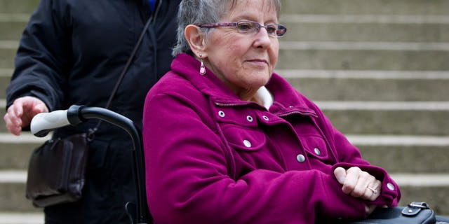 Dec. 1, 2011: Gloria Taylor arrives in a wheelchair at British Columbia Supreme Court in Vancouver, B.C. Taylor, who has Lou Gehrig's disease, is seeking the right to a doctor-assisted suicide in a challenge at B.C. Supreme Court.