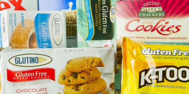 San Diego, California, United States - December 19, 2011: Eight Gluten Free Certified Products shot in a Studio Setting. Celiac Disease sufferers must consume gluten free or wheat, barley, rye free meals in order to avoid the severe side-effects of the disease. Many of these products also are GMO Free in their composition.