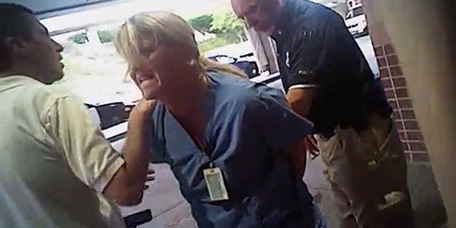 Alex Wubbels was dragged out of the hospital in handcuffs after she refused to allow blood to be drawn from an unconscious patient.
