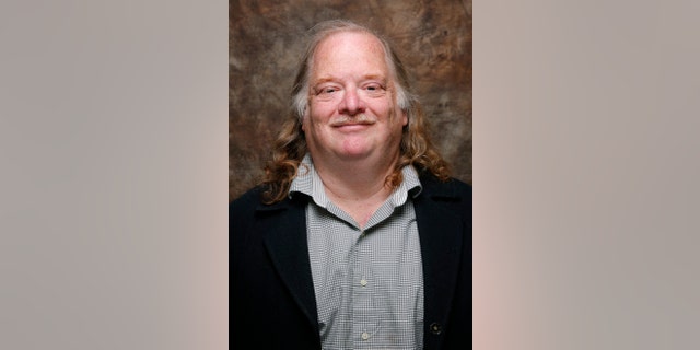Jonathan Gold, from the movie " CITY OF GOLD" poses at the L.A. Times photo & video studio at the Sundance Film Festival, in Park City, Utah in 2015.