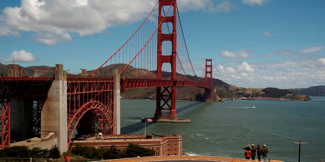 May 25, 2012: Visitors walk on walking path and bicycle trail near the Golden Gate Bridge in San Francisco, California.